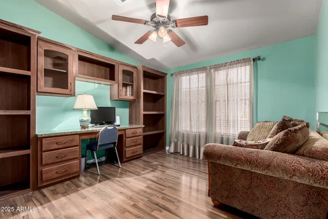 a living room with furniture and a window