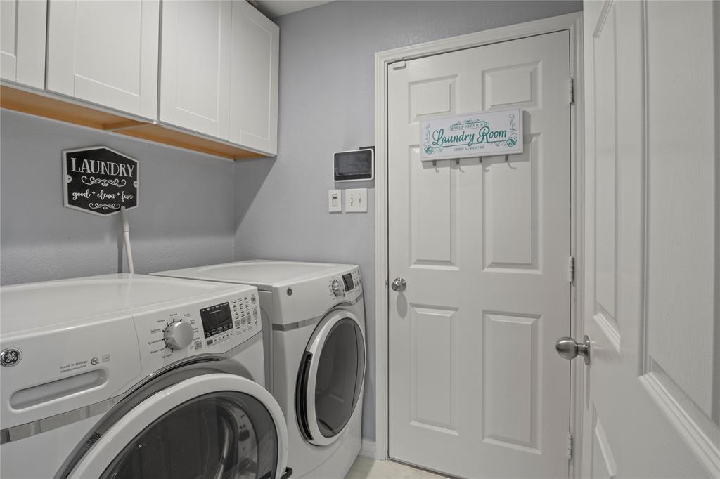 8342 Timberbrook Lane Dallas, TX 75249 - Photo 20 of 25 a view of washer and dryer
