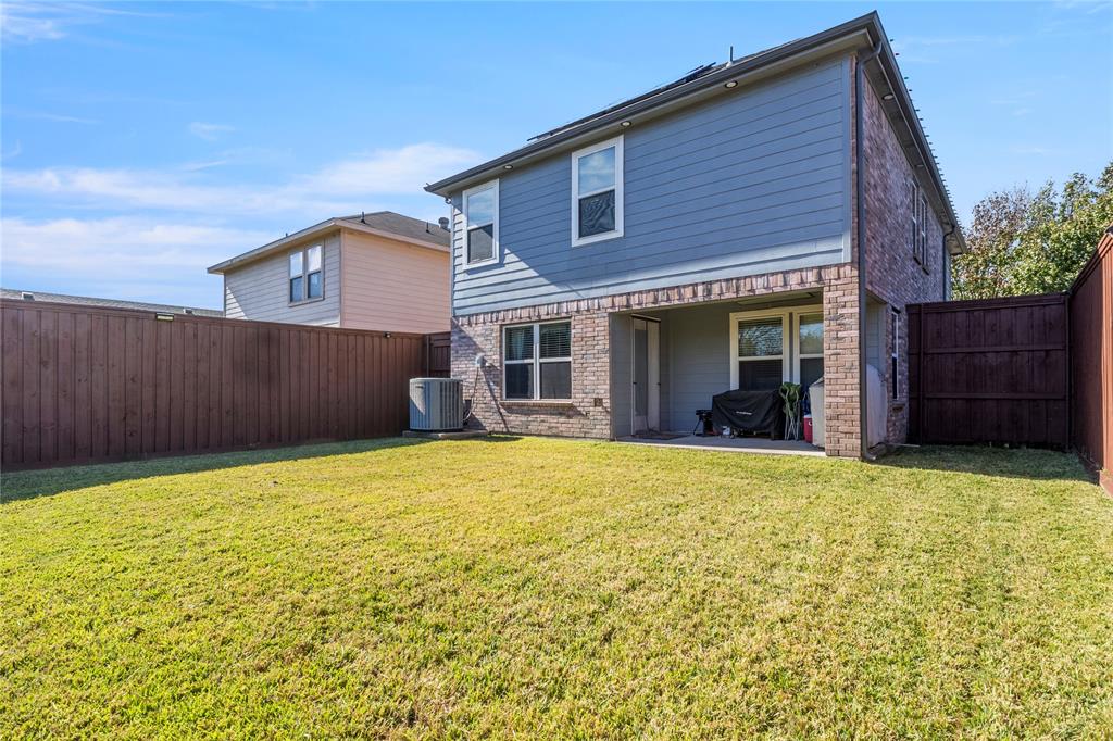 8342 Timberbrook Lane Dallas, TX 75249 - Photo 22 of 25 a front view of a house having yard