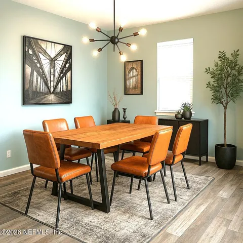a view of a livingroom with a ceiling fan & a ceiling fan