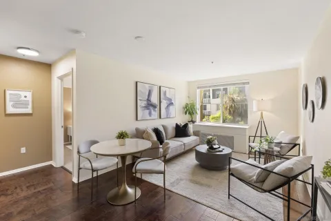 a living room with furniture and a window
