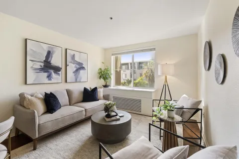 a living room with furniture and window