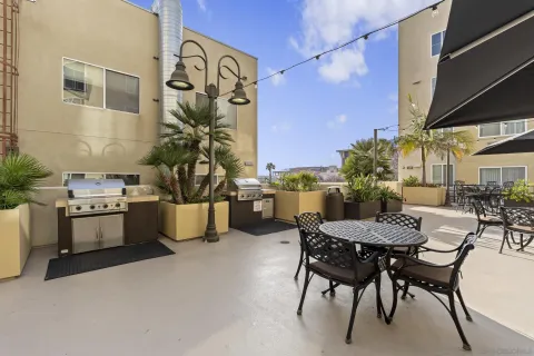 a view of dinning table and chairs in the patio