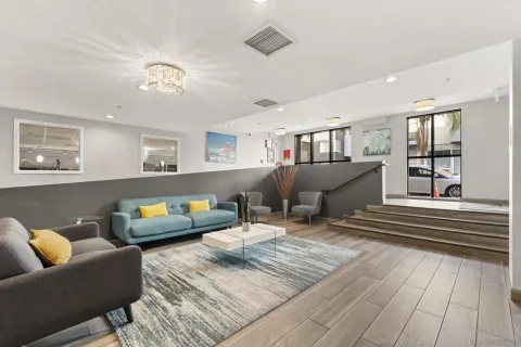 a living room with furniture and a window