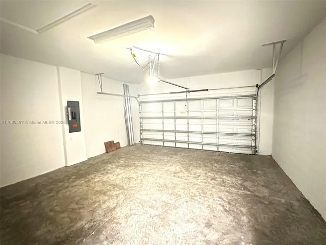 a view of a room with window and cabinet