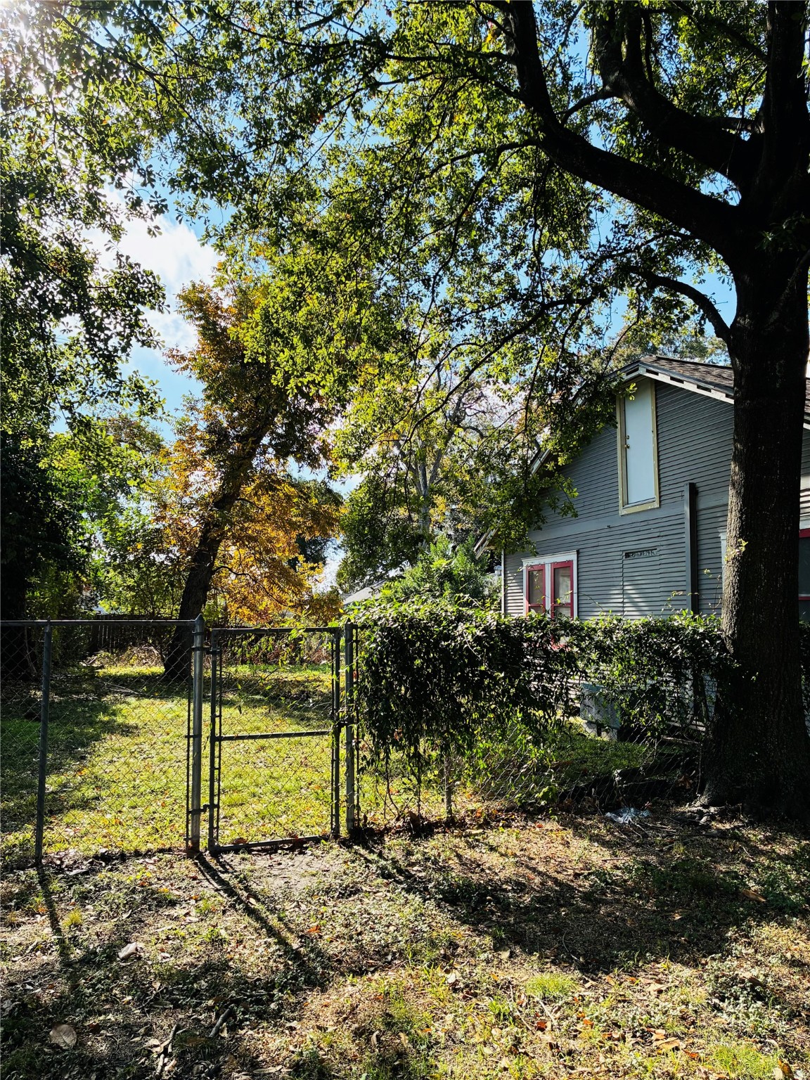 702 Caplin Street Houston, TX 77022 - Photo 17 of 18 a view of a house with a yard