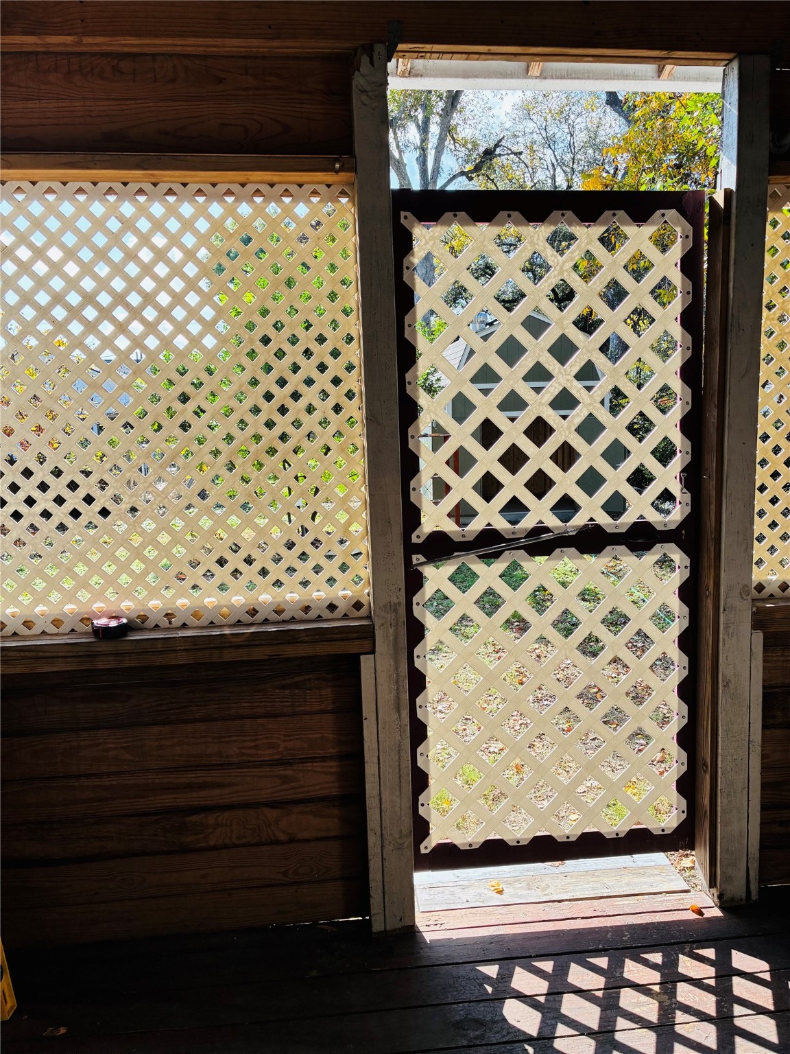 702 Caplin Street Houston, TX 77022 - Photo 5 of 18 a view of a wooden door