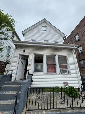 a front view of a house with a balcony