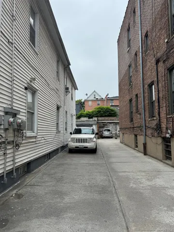 a view of a street with cars
