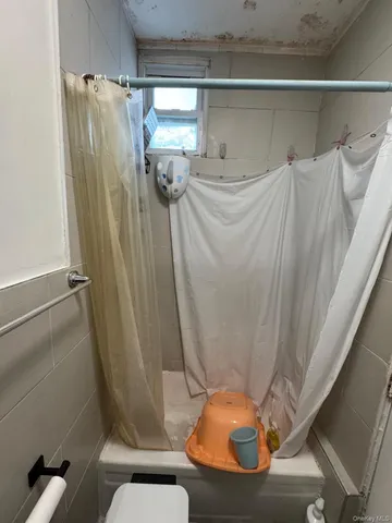 a bathroom with a sink and toilet