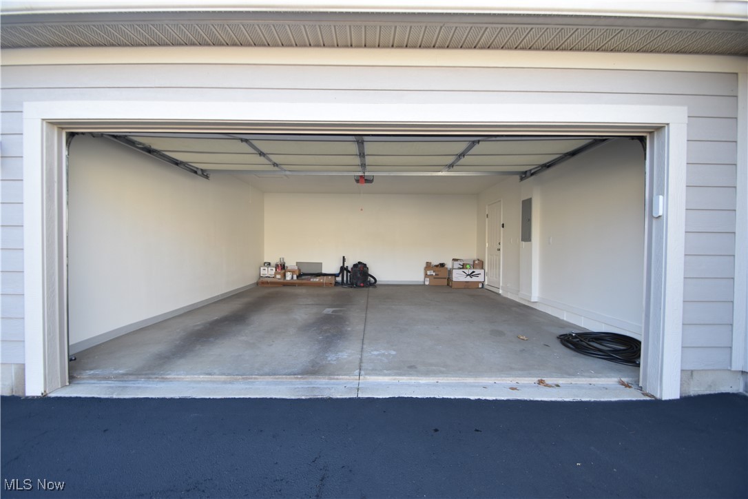 9151 Springfield Road, Unit 1002 Youngstown, OH 44514 - Photo 33 of 38 Garage with a carport