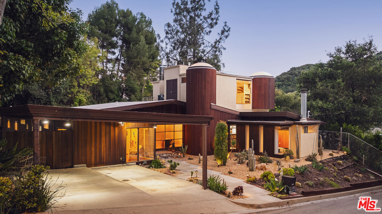13044 Sky Valley Road Los Angeles, CA 90049 - Photo 2 of 29 a front view of a house