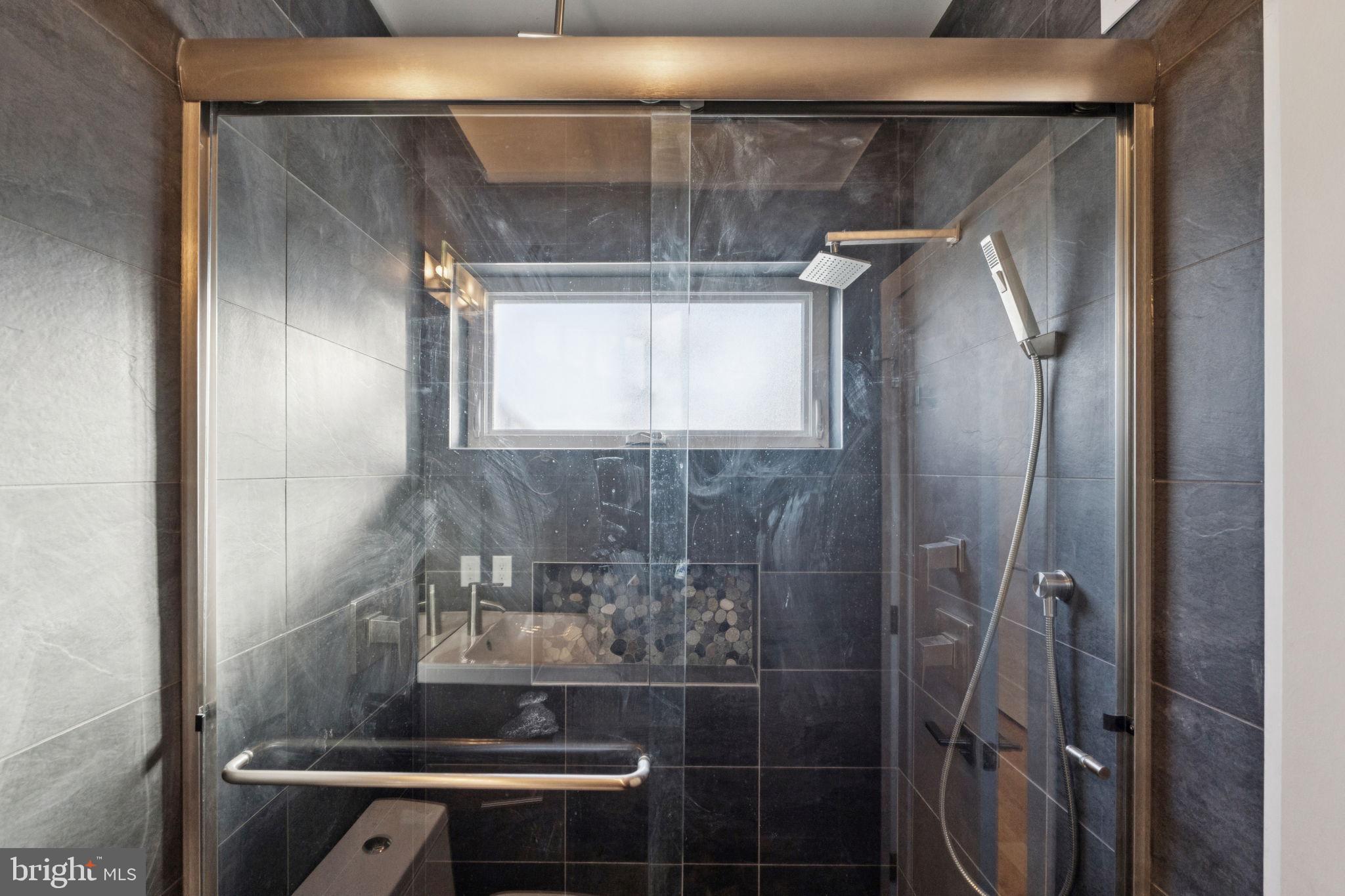 1825 Gerritt Street Philadelphia, PA 19146 - Photo 18 of 34 a bathroom with a mirror