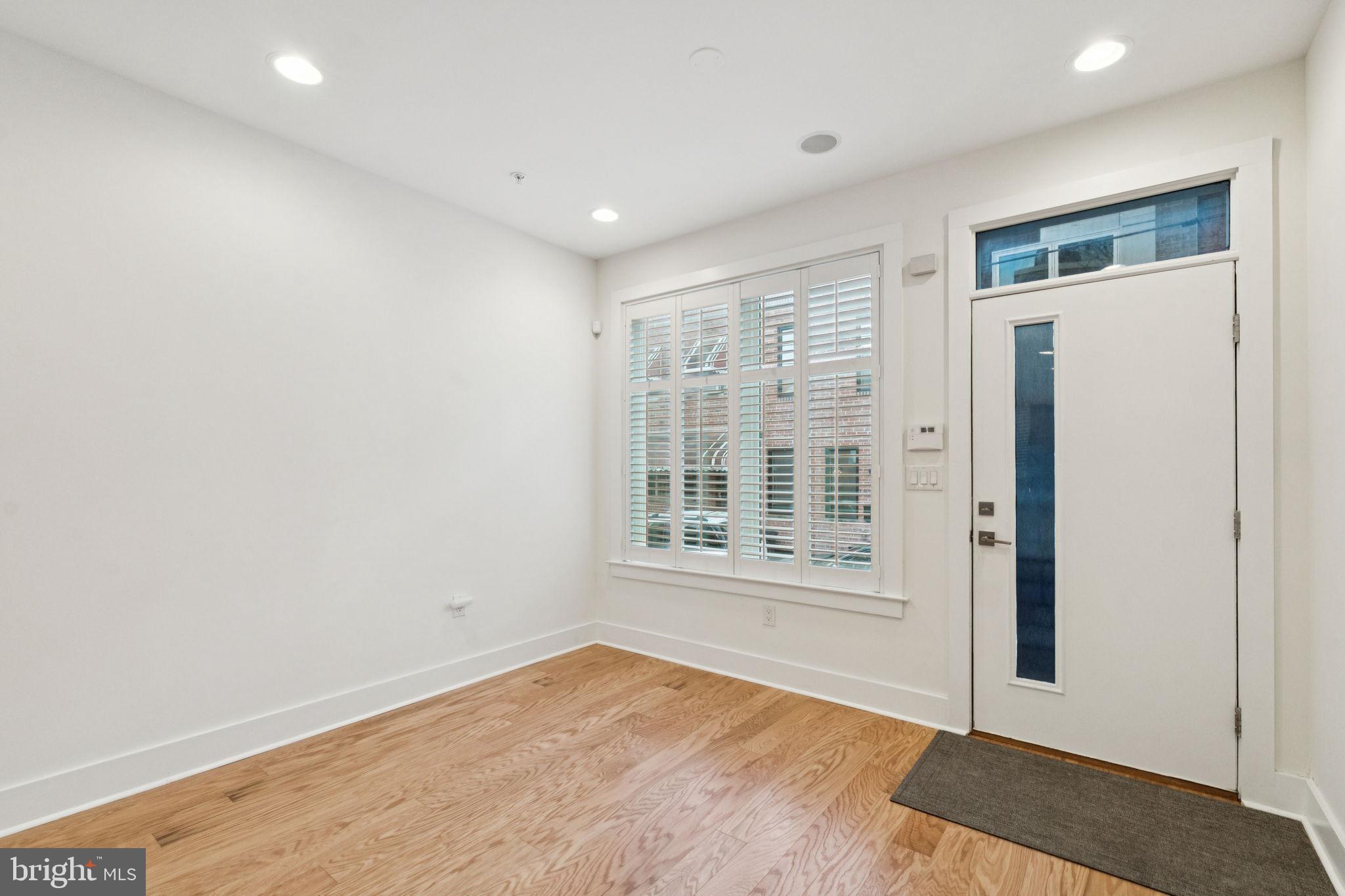 1825 Gerritt Street Philadelphia, PA 19146 - Photo 5 of 34 an empty room with wooden floor and windows