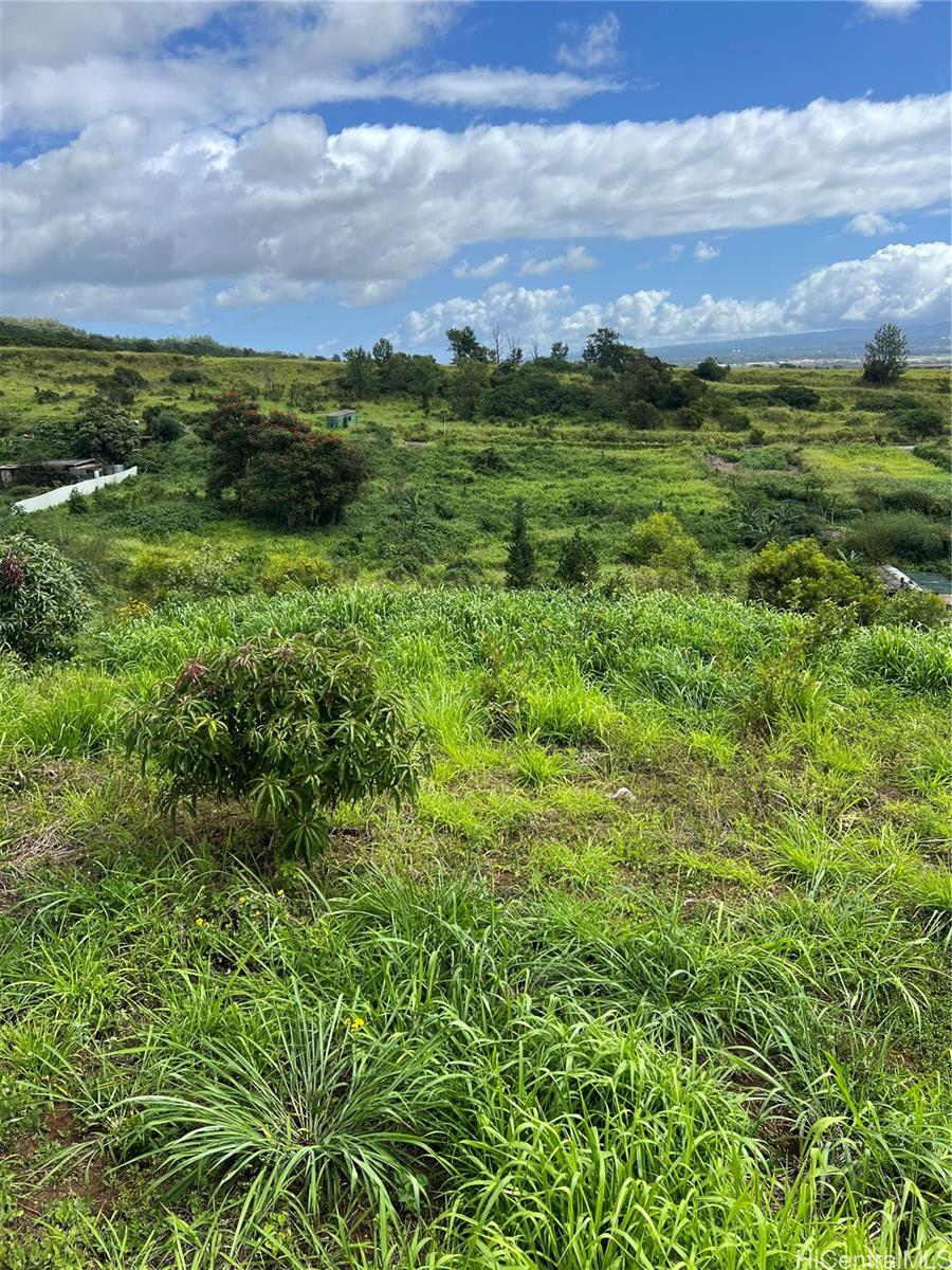 94-1100 Kunia Road, Unit 88 Waipahu, HI 96797 - Photo 1 of 3 a view of lake with mountain
