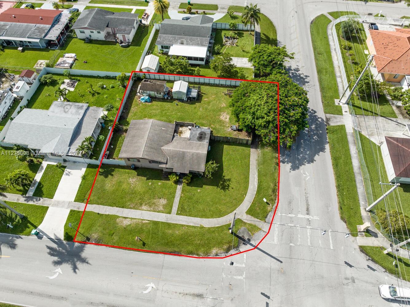 15140 Southwest 296th Street Homestead, FL 33033 - Photo 3 of 13 an aerial view of a houses with swimming pool