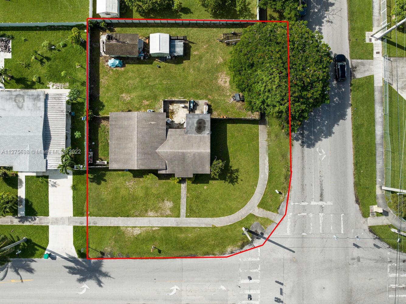 15140 Southwest 296th Street Homestead, FL 33033 - Photo 9 of 13 an aerial view of a house