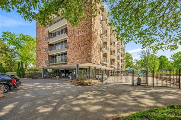 a building with trees in front of it