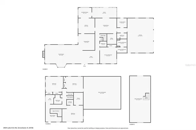 a living room with furniture a fireplace and large windows