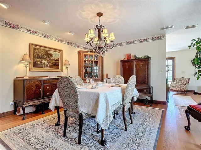 a kitchen with a stove a sink and a refrigerator
