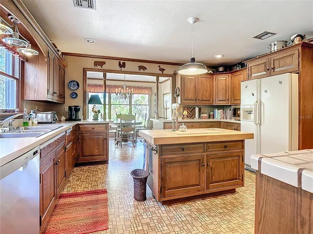 a view of a porch with wooden floor and outdoor space