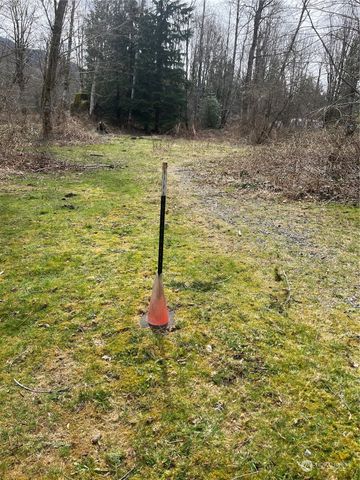 a view of a wooden floor with a yard