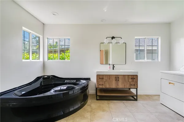 a living room with a couch and a window