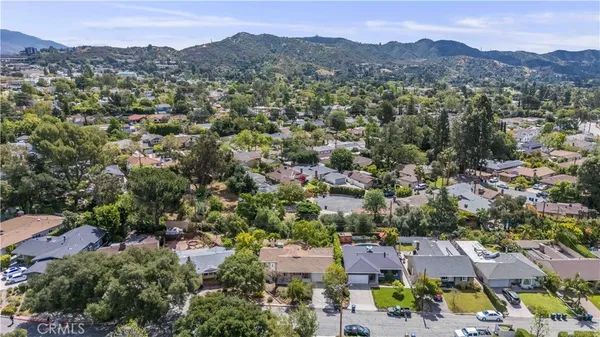 an aerial view of a city with lots of residential buildings