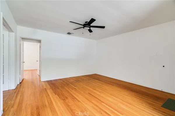 a view of a big room with wooden floor