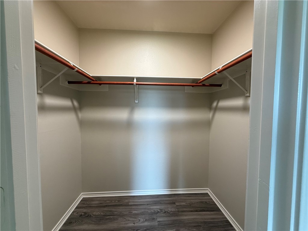 1207 Sacramento Street Portland, TX 78374 - Photo 12 of 22 a view of a room with wooden floor
