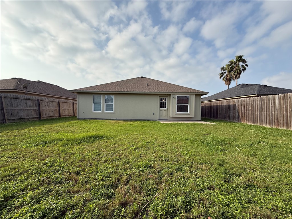 1207 Sacramento Street Portland, TX 78374 - Photo 20 of 22 a house view with a garden space