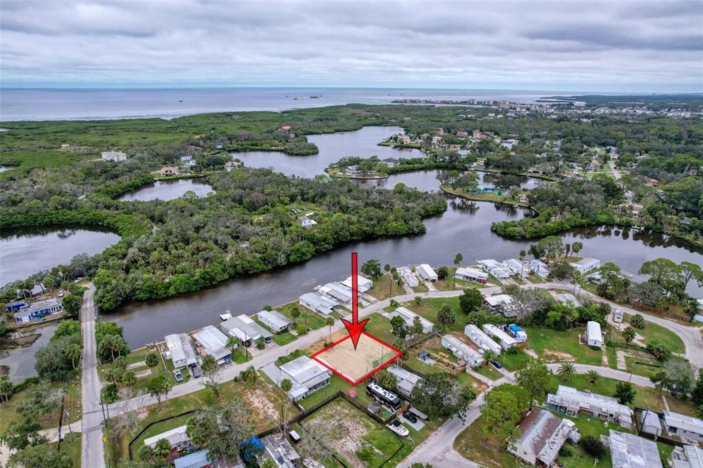 6836 Edgewater Drive New Port Richey, FL 34652 - Photo 12 of 19 an aerial view of residential houses with outdoor space and street view