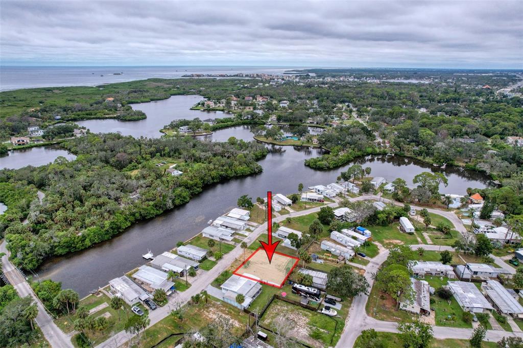 6836 Edgewater Drive New Port Richey, FL 34652 - Photo 13 of 19 an aerial view of residential houses with outdoor space