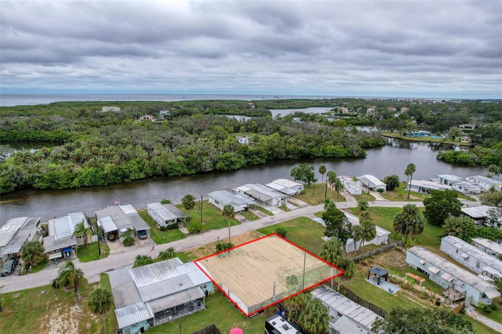 6836 Edgewater Drive New Port Richey, FL 34652 - Photo 14 of 19 an aerial view of a house with a lake view