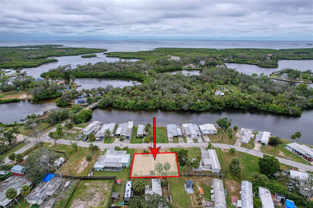 6836 Edgewater Drive New Port Richey, FL 34652 - Photo 9 of 19 an aerial view of houses with yard