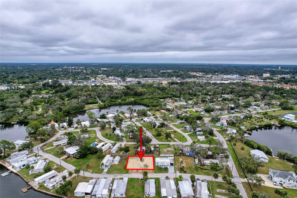 6836 Edgewater Drive New Port Richey, FL 34652 - Photo 10 of 19 an aerial view of residential building with green space