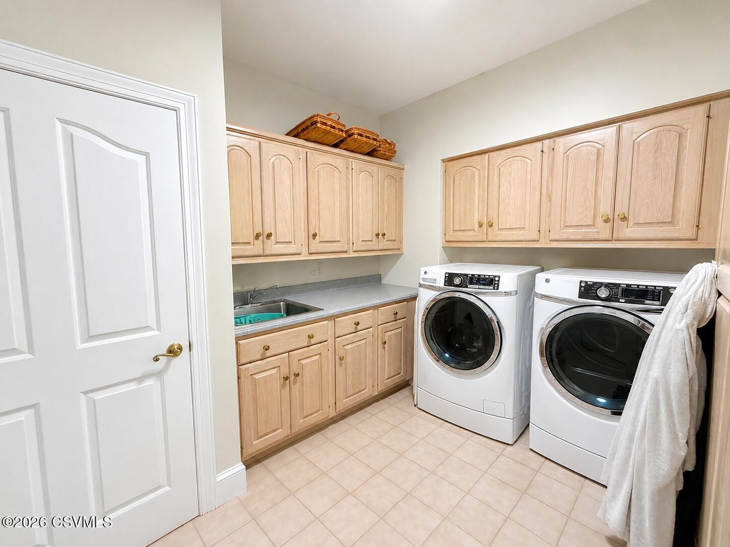 50 Sweet Gum Road Selinsgrove, PA 17870 - Photo 60 of 82 a utility room with sink dryer and washer