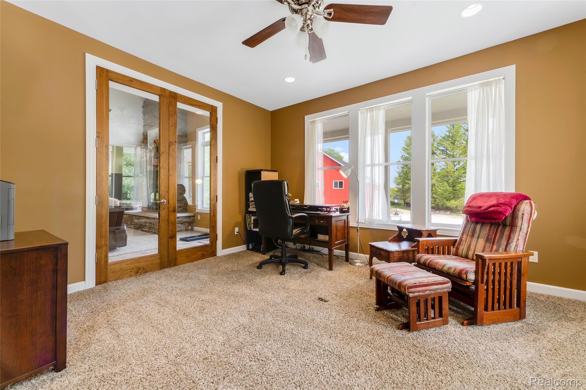 13085 Rohn Road Fenton, MI 48430 - Photo 15 of 52 Office space with french doors, ceiling fan, light carpet, healthy amount of natural light, and recessed lighting