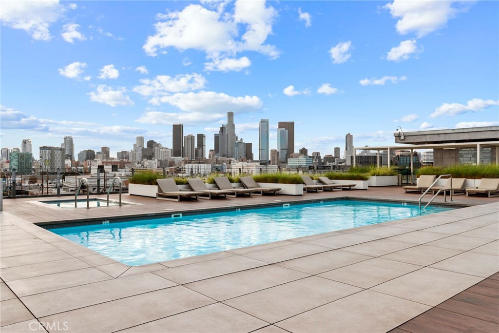 530 South Hewitt Street, Unit 154 Los Angeles, CA 90013 - Photo 20 of 32 a view of a swimming pool and outdoor seating