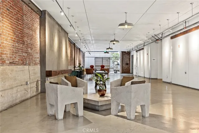 a view of a building with a table and chairs