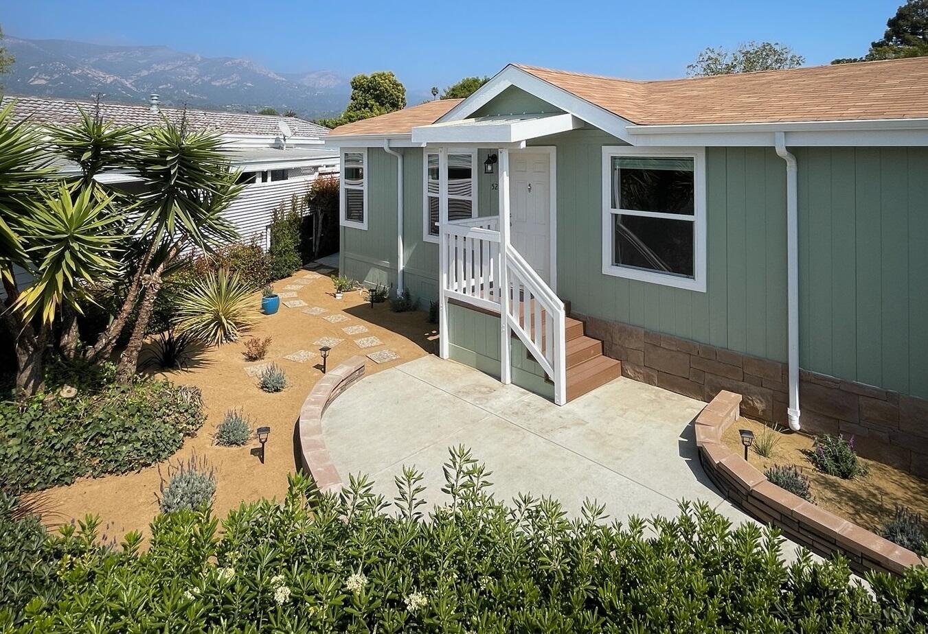 333 Old Mill Road, Unit 52 Santa Barbara, CA 93110 - Photo 1 of 29 a view of a house with backyard and sitting area