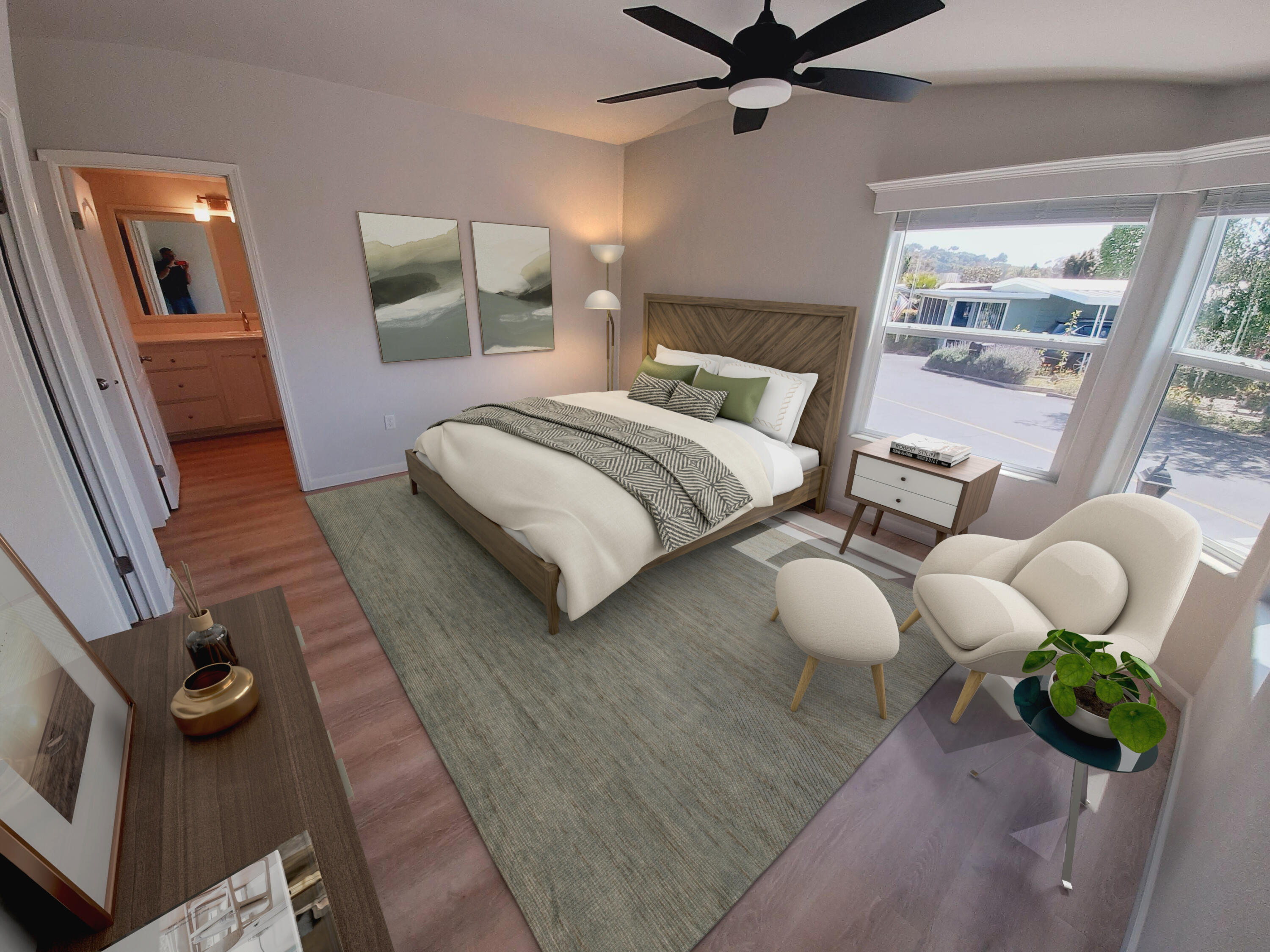 333 Old Mill Road, Unit 52 Santa Barbara, CA 93110 - Photo 14 of 29 a bedroom with a bed mirror and a chandelier