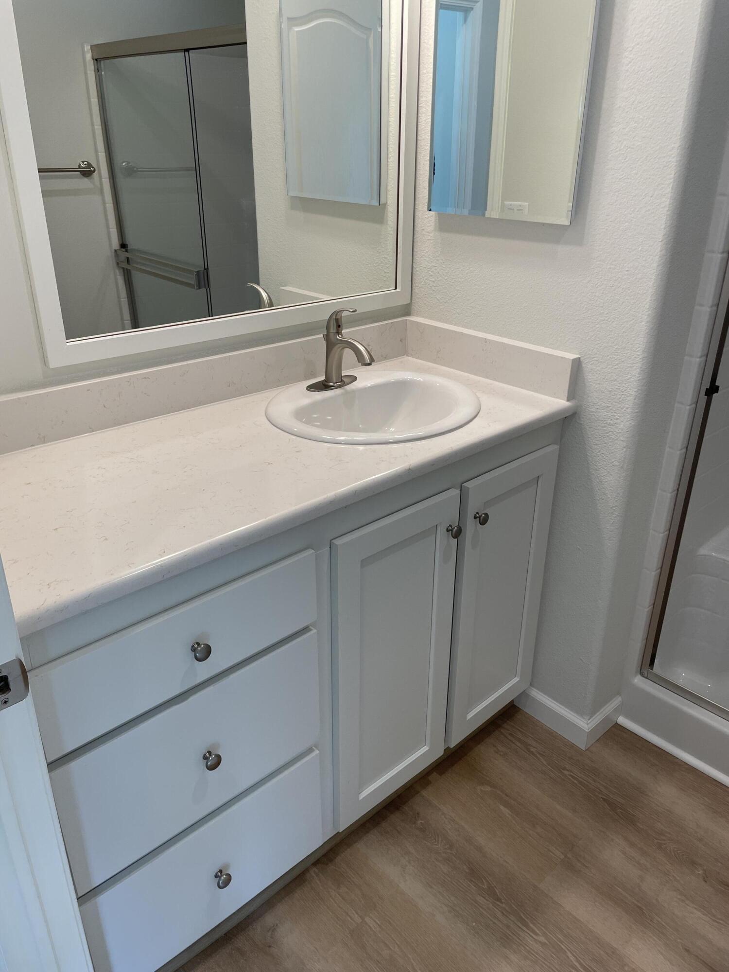 333 Old Mill Road, Unit 52 Santa Barbara, CA 93110 - Photo 20 of 29 a bathroom with a sink and a mirror