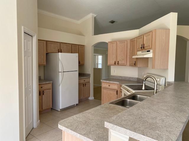 4497 Southwest Gadshaw Road Port St. Lucie, FL 34953 - Photo 2 of 14 kitchen