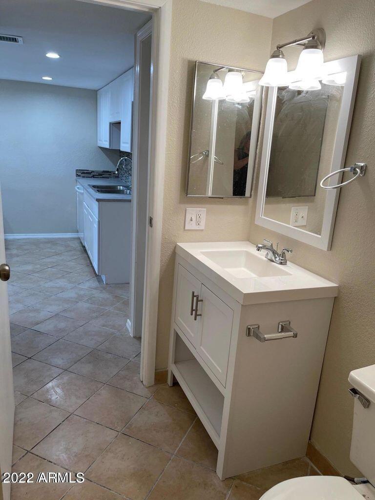 3511 East Baseline Road, Unit 1065 Phoenix, AZ 85042 - Photo 8 of 17 Fully remodeled bathroom downstairs
