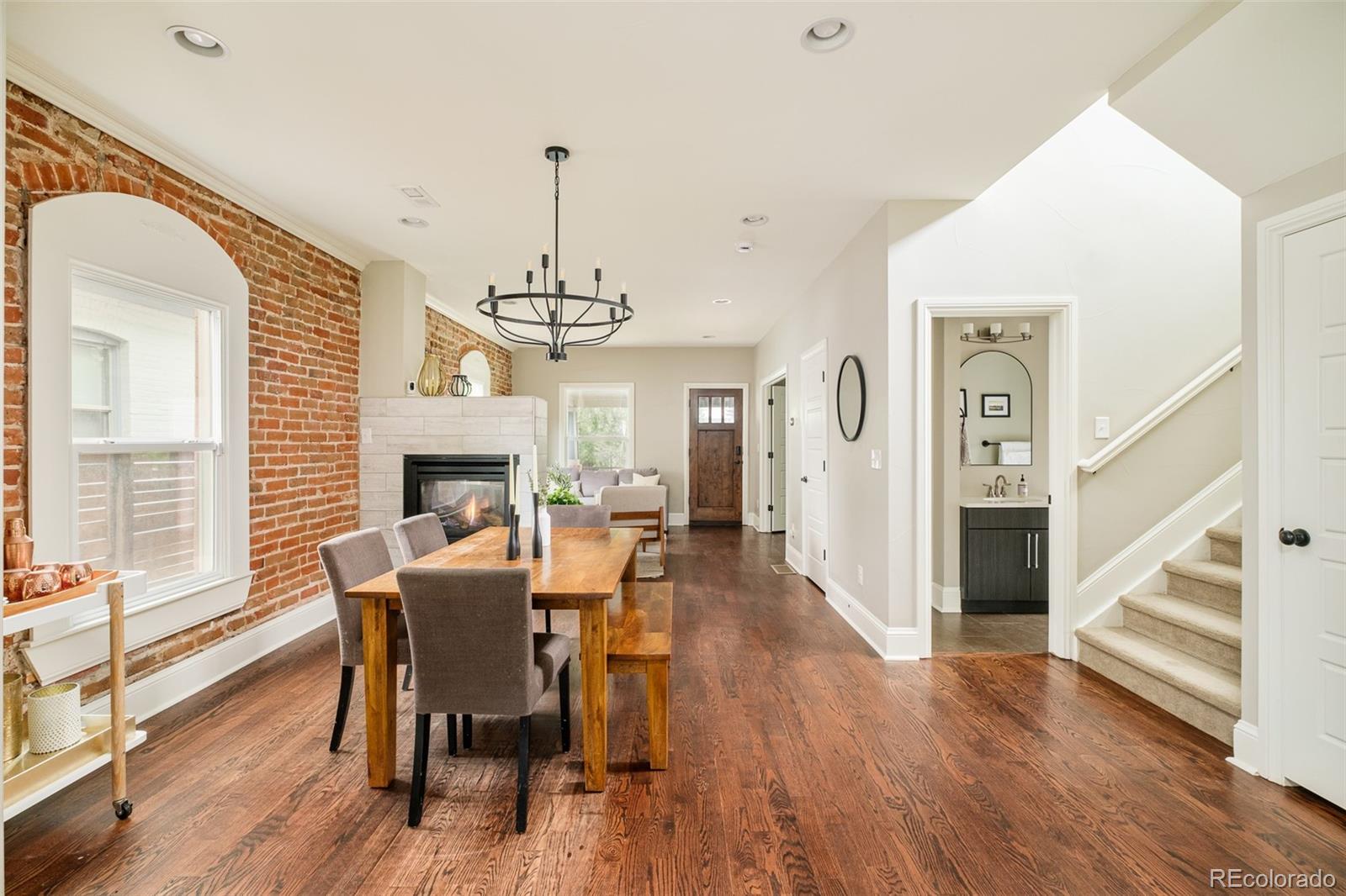 3864 Osceola Street Denver, CO 80212 - Photo 20 of 43 a view of a dining room with furniture window and wooden floor