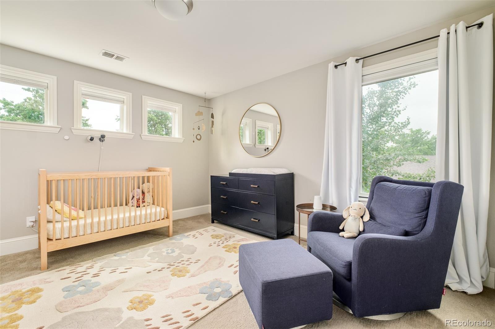 3864 Osceola Street Denver, CO 80212 - Photo 31 of 43 a living room with furniture and a window
