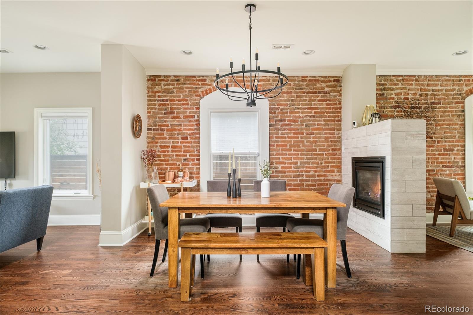 3864 Osceola Street Denver, CO 80212 - Photo 8 of 43 a view of a dining room with furniture window and wooden floor