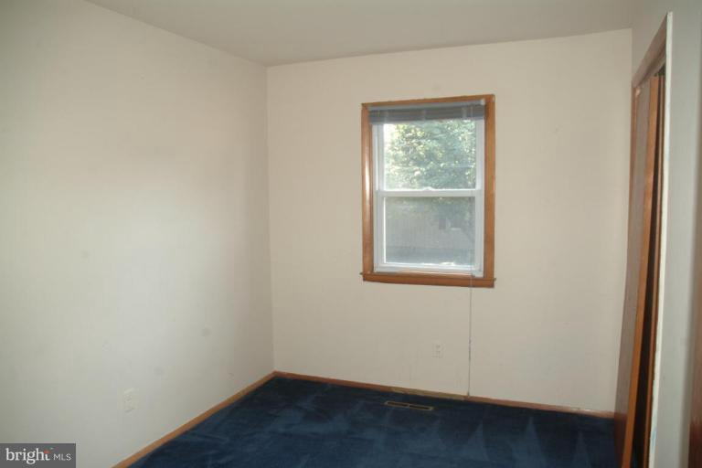 5808 Meridale Road Catonsville, MD 21228 - Photo 5 of 9 an empty room with a window