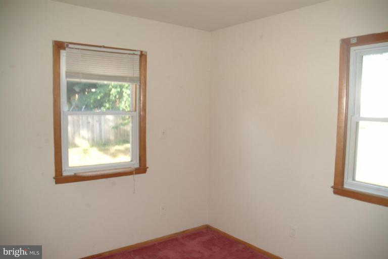 5808 Meridale Road Catonsville, MD 21228 - Photo 7 of 9 an empty room with a window